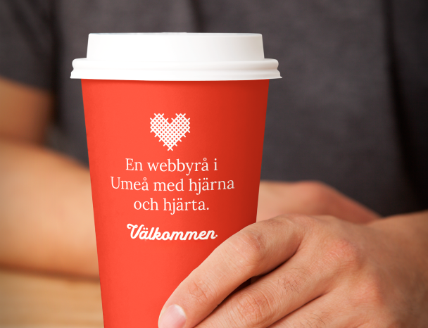 Mugg med texten En webbyrå i Umeå med hjärna och hjärta